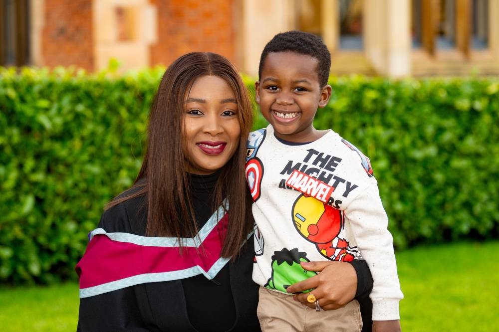 new International female graduate and son at Winter graduation 2023