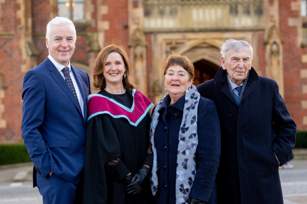 Patricia Slevin, member of Queen's Senate, celebrates graduating with her family at Winter graduation 2023