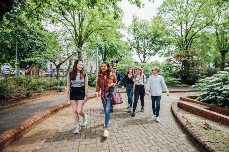 students walking together in a park