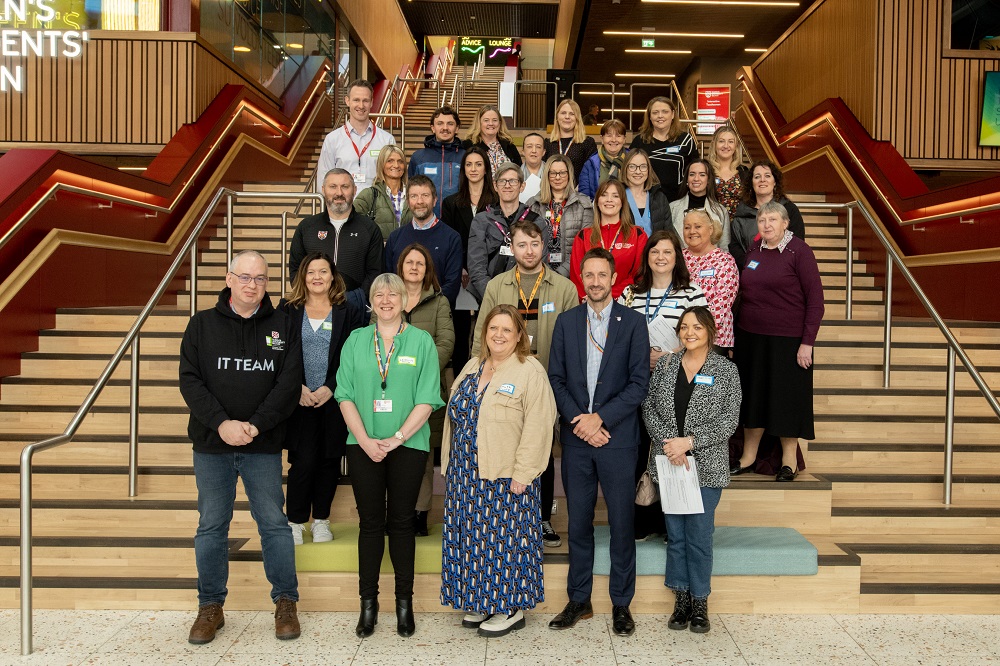 group of attendees at the launch of Queen's Inclusive Employment Scheme 2023