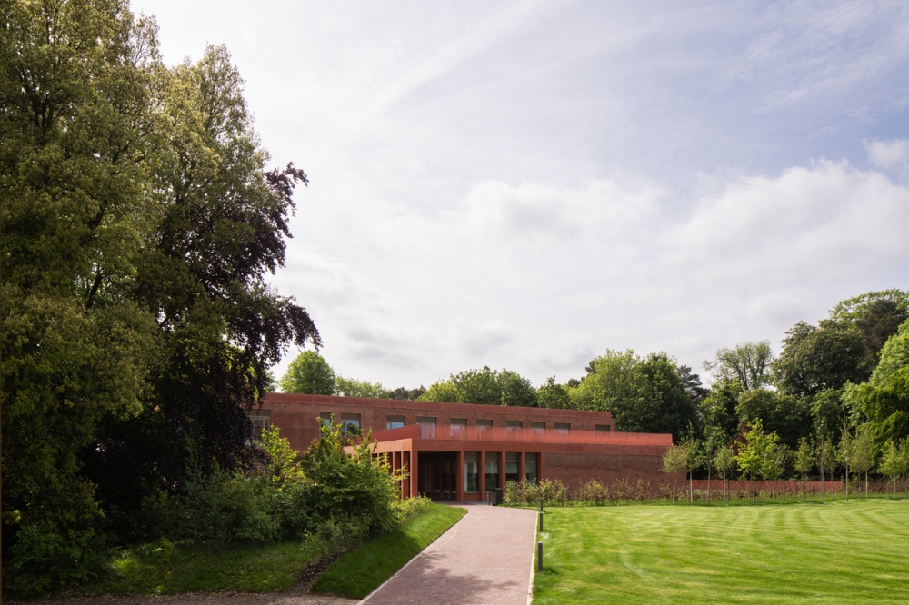 ground view of new building and lawn on Riddel Hall site, 2023