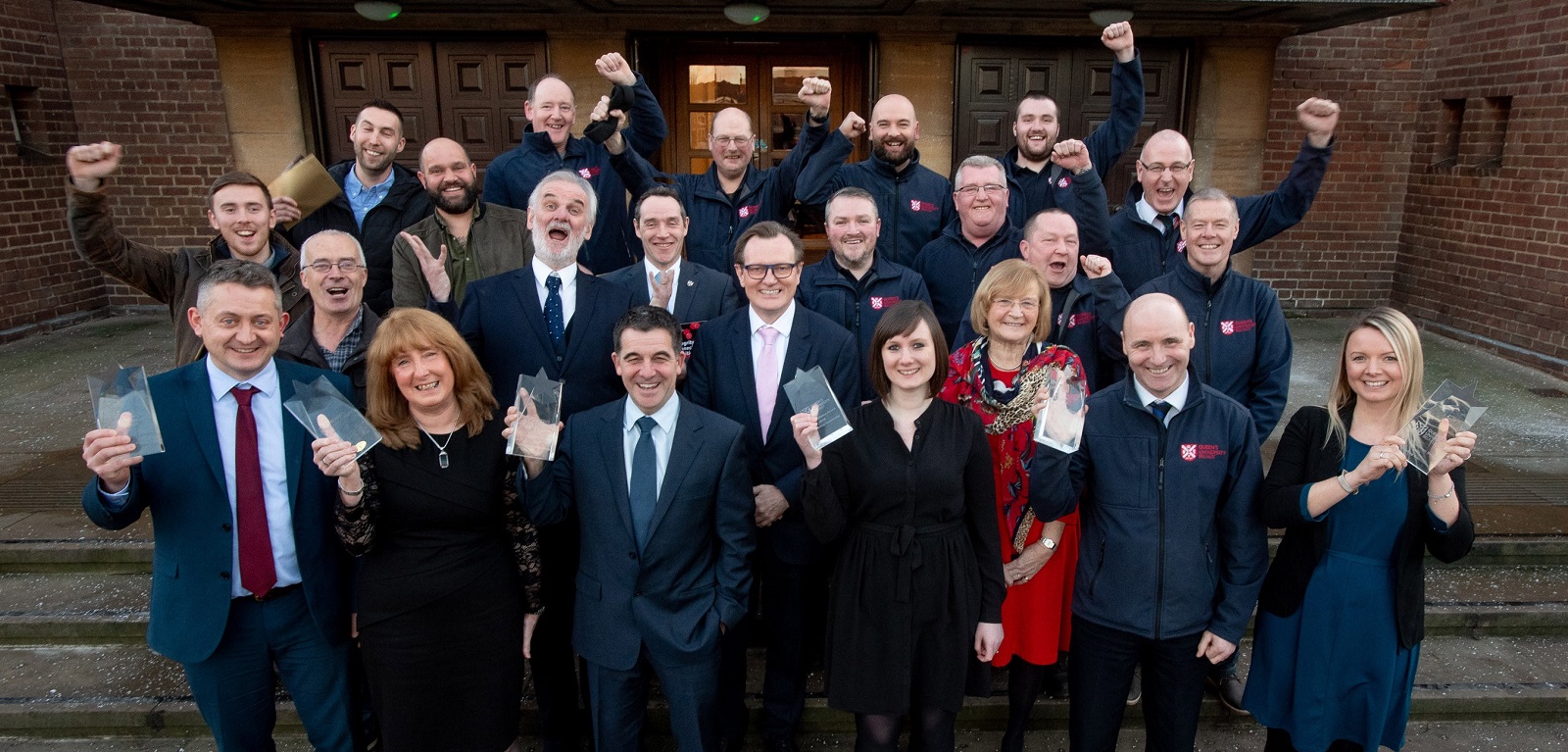 Winners of the 2018 Staff Excellence Awards photographed outside the Whitla Hall with President and Vice-Chancellor Professor Ian Greer